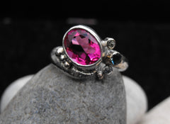 Bright pink oval ring